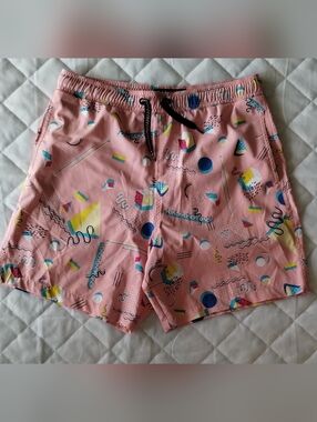 Surf Society Pink Swimwear Shorts with Black Label and Teal Trim